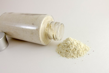 Amber powder in a clear bottle. Used for processing amber stones.