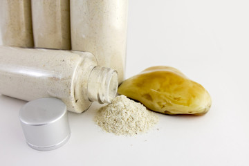 Amber powder in a clear bottle. Used for processing amber stones. Comosite with amber powder and...