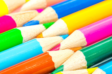 Close up color pencils isolated on white background.