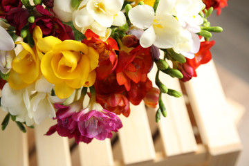 Beautiful spring freesia flowers on blurred background, closeup