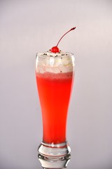 red cocktail with strawberry and mint isolated on white