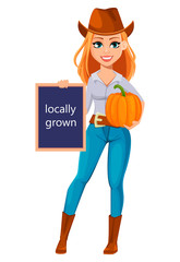 Young pretty farmer woman in cowboy hat