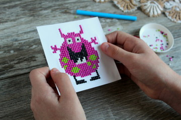 The picture of the diamond mosaic funny monsters, needlework.
