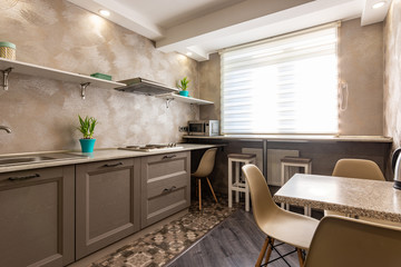 Spacious kitchen in an apartment high-rise building