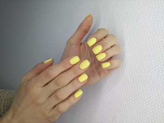 Fashionable yellow manicure
