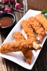 fried chicken with rice and vegetables