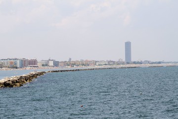 View from the Adriatic sea of  wheel and skyscraper in Cesenatico in Italy