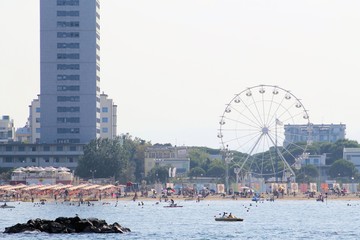 View from the Adriatic sea of  wheel and skyscraper in Cesenatico in Italy