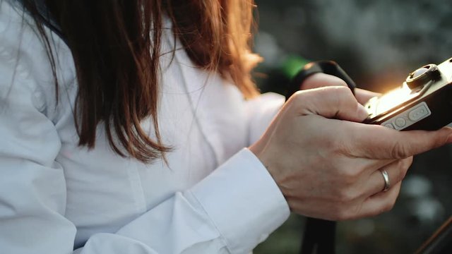 Photographer professional makes metering exposure meter.