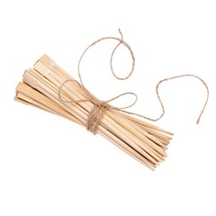 Bunch of bamboo sushi sticks or chopsticks, isolated on white background