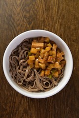 mushrooms in bowl on wooden table