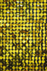 Bright, festive, sparkling, dazzling, abstract background. Festive decorations and decoration of round shiny metallic sequins. 