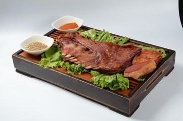 grilled beef steak with vegetables on white plate