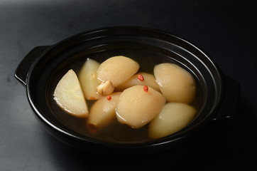 fried eggs with bacon and vegetables