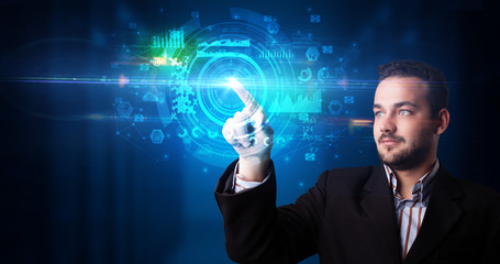 Man touching hologram screen displaying medical symbols and charts
