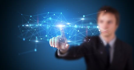 Man touching hologram screen displaying modern web system
