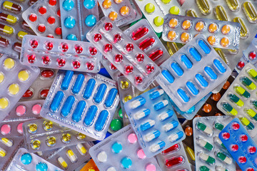 Drug prescription for treatment medication. Pharmaceutical medicament, cure in container for health. Pharmacy theme, capsule pills with medicine antibiotic in packages.