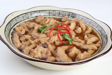 chicken with rice and vegetables in pan