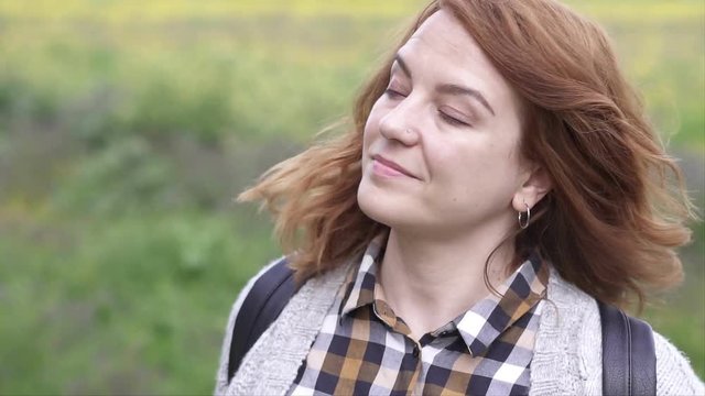 Woman Enjoying Spring in the fields Real People, slow motion video