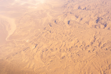 Aerial view of the Sinai mountains and sandy plateau of Egypt.