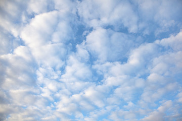 Clouds in a bright  blue sky.