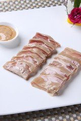 slices of bacon on a plate