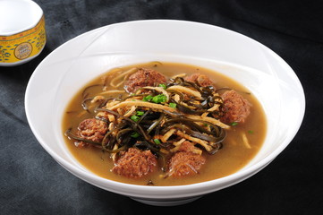 thai noodle soup with meat and vegetables