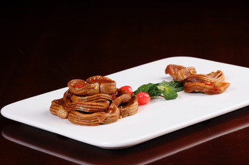 plate of meat and vegetables on table