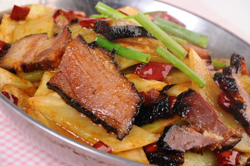 grilled beef steak with vegetables on white plate