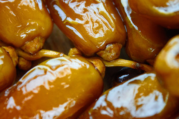Sweet arabic algerian dates fruits on a wooden floor