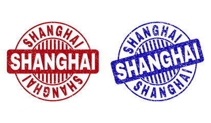 Grunge SHANGHAI round stamp seals isolated on a white background. Round seals with grunge texture in red and blue colors. Vector rubber imprint of SHANGHAI tag inside circle form with stripes.