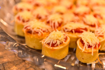 Fototapeta na wymiar brazilian snacks, guava mini quiche with parmesan cheese