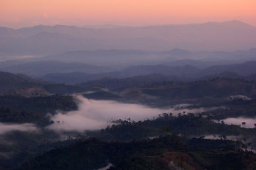 sea fog on the mountain hills in the morning