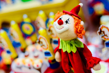 doll on a white background, children's party, clown theme, vintage, children's party, theme party, background, circus background, clown background, children's day, clown doll toy, carnival party © liligluck