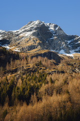 View of one of the peaks of the Monte Rosa (Piedmont, Italy) at the end of winter, with the light of the sunset