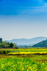 Fototapeta premium Countryside and mountain scenery with blue sky background 