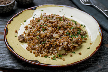 Fried buckwheat porridge with onions and mushrooms