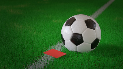 Football or soccer on green grass with red card on white line, football referee mistakes concept, football judge penalty