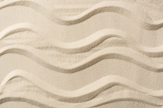 top view of textured background with sand and smooth lines