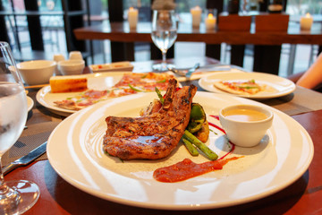 pork chop on table in restaurant