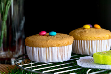 Cupcake and Colorful Candy on Grille