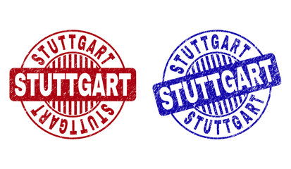 Grunge STUTTGART round stamp seals isolated on a white background. Round seals with grunge texture in red and blue colors. Vector rubber overlay of STUTTGART tag inside circle form with stripes.