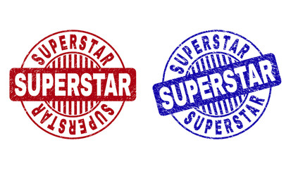 Grunge SUPERSTAR round stamp seals isolated on a white background. Round seals with distress texture in red and blue colors. Vector rubber overlay of SUPERSTAR title inside circle form with stripes.