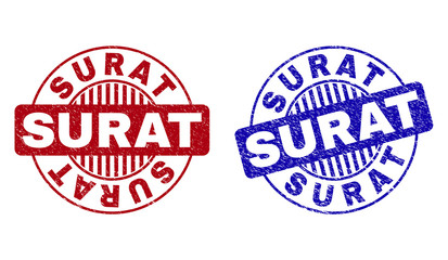 Grunge SURAT round stamp seals isolated on a white background. Round seals with grunge texture in red and blue colors. Vector rubber overlay of SURAT caption inside circle form with stripes.