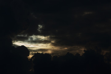 heaven light in dramatic sky with dark cloud