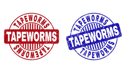 Grunge TAPEWORMS round stamp seals isolated on a white background. Round seals with grunge texture in red and blue colors. Vector rubber imitation of TAPEWORMS tag inside circle form with stripes.