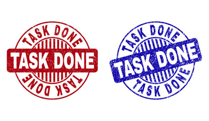 Grunge TASK DONE round stamp seals isolated on a white background. Round seals with distress texture in red and blue colors. Vector rubber watermark of TASK DONE title inside circle form with stripes.