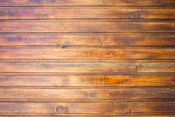Fototapeta premium yellow brown fence wall of wooden planks. horizontal lines. rough surface texture