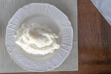 Nigerian Pounded yam on white plate ready to eat