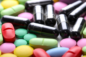 Pharmacy theme. Multicolored Isolated Pills and Capsules.